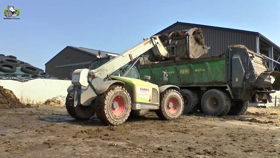 Meststrooien met Hawe en Steyr 6180 CVT en Claas verreiker